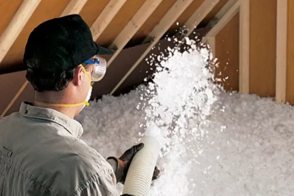 pic-of-guy-blowing-insulation